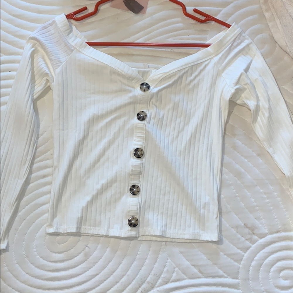White long sleeve off the shoulder button up.